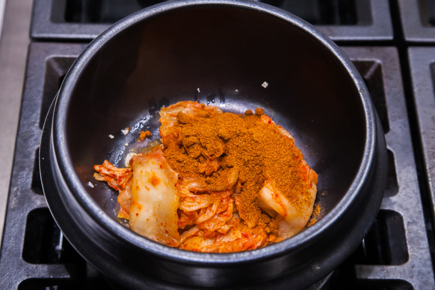 Soondubu Jjigae - adding kimchi