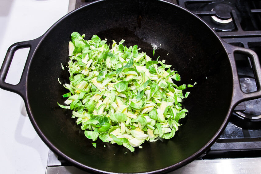 Brussels Sprout Chinese Sausage Stirfry - stirfrying